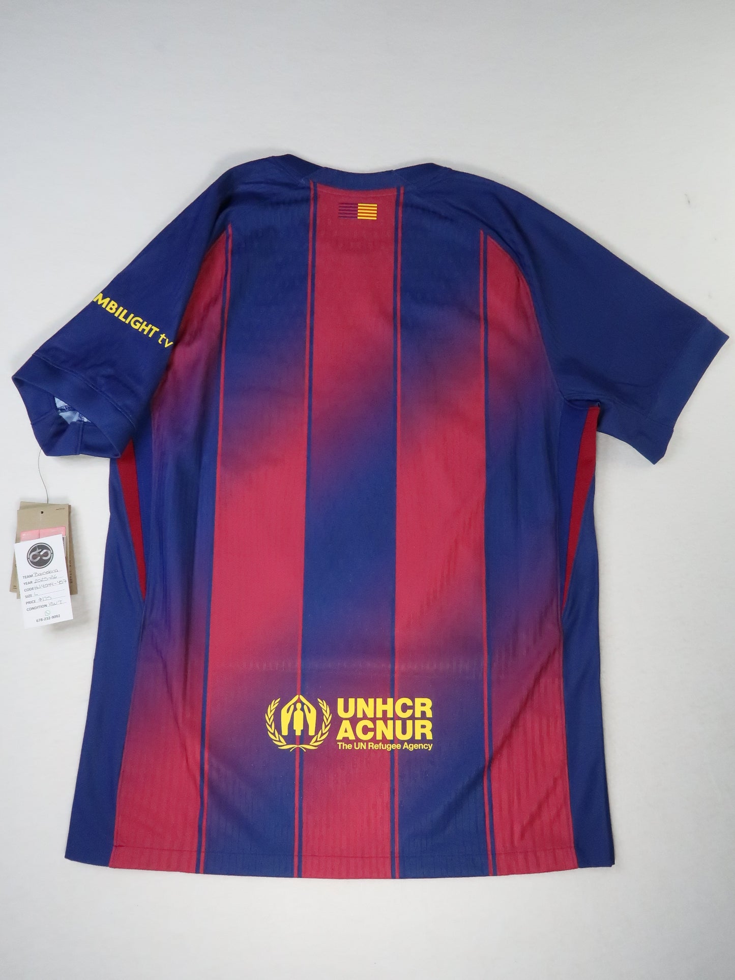 2025-26 FC Barcelona home jersey back, UNHCR branding