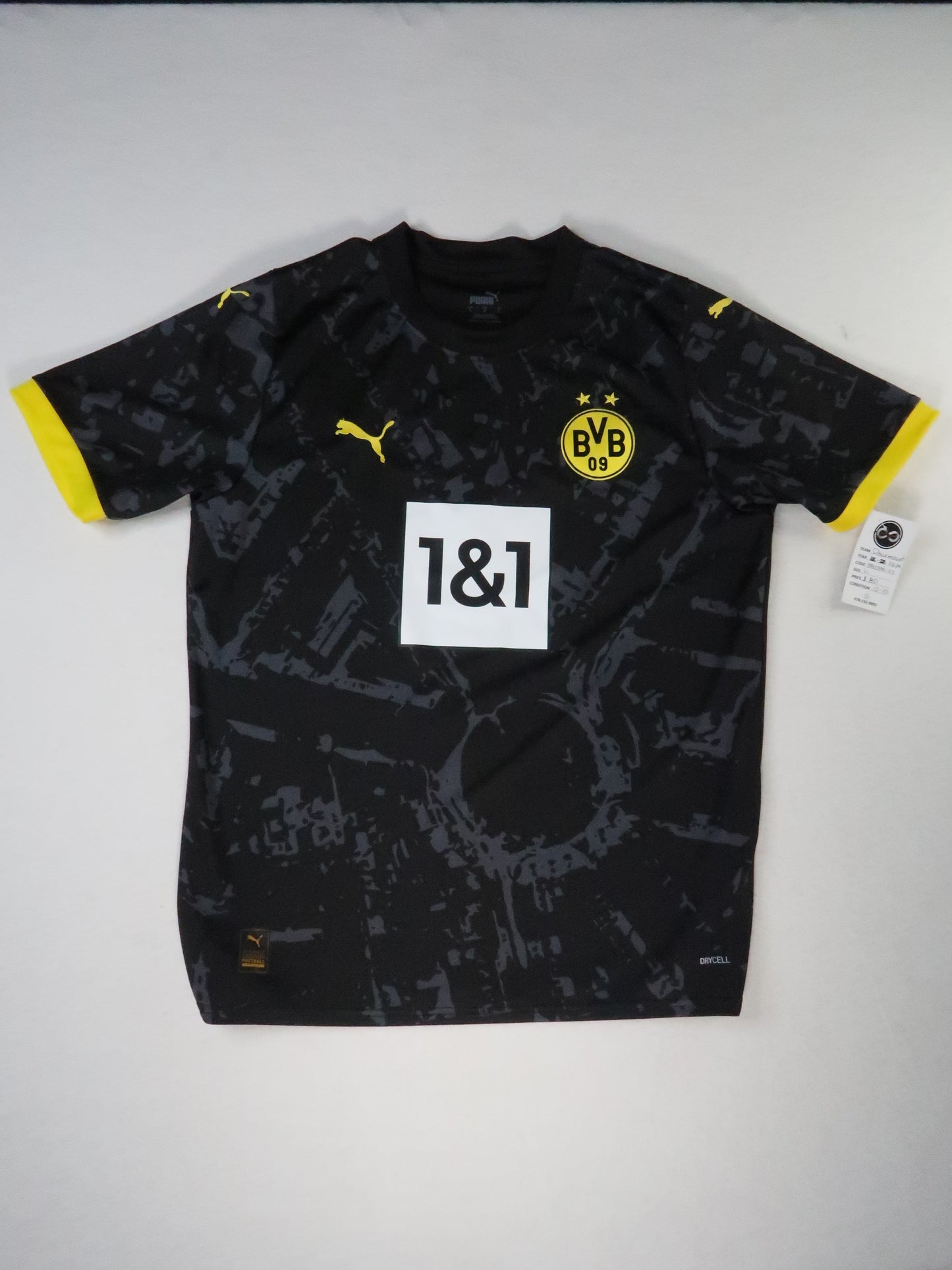 2023-24 Borussia Dortmund away jersey front, black camo pattern with 1&1 sponsor