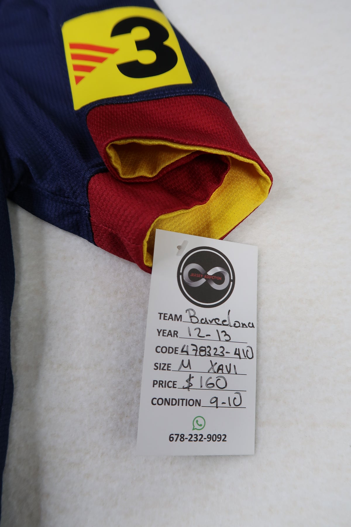 2012-13 Barcelona Xavi Jersey tag